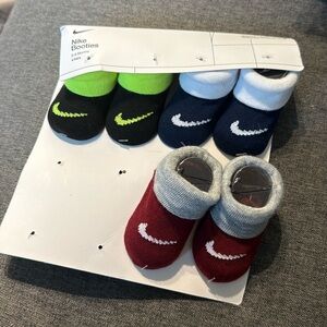Nike Booties 0-6 months 3 pair newborn socks- booties